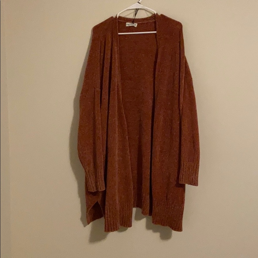 Cardigan rust orange in color heavy and thick